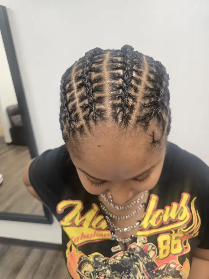 Straight-back cornrows by Northland African Hair Braiding in Columbus, OH