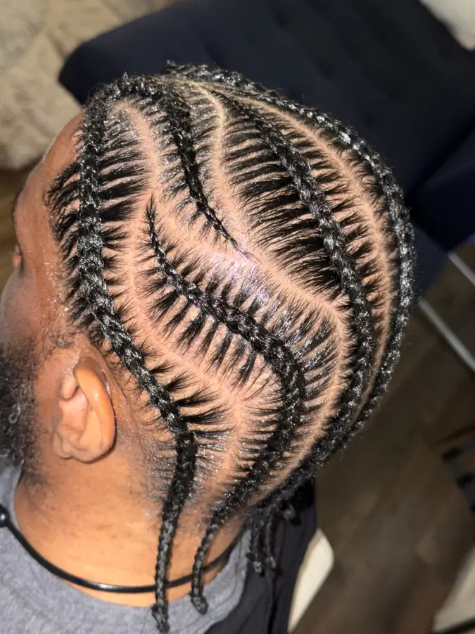 Men's curved cornrow design in Columbus, OH
